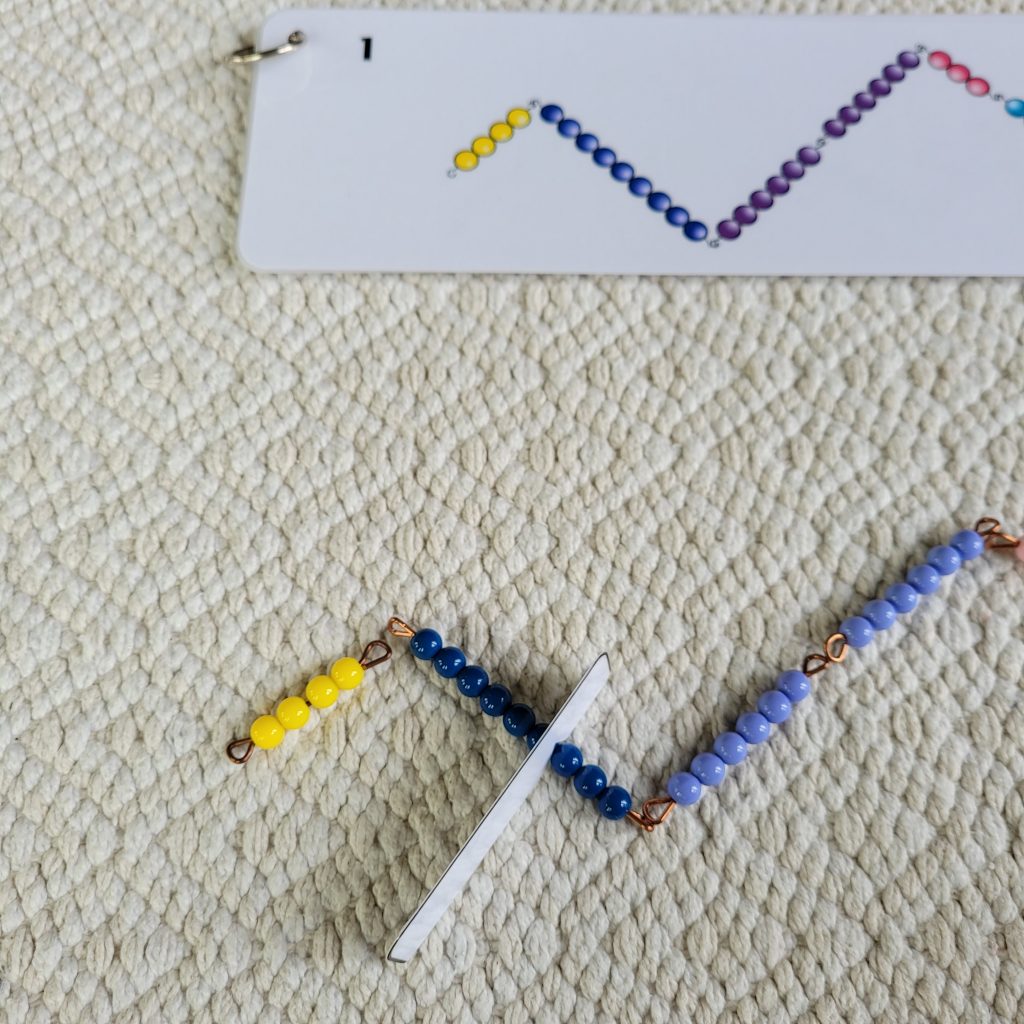 place a golden bead bar to the left of the indicator